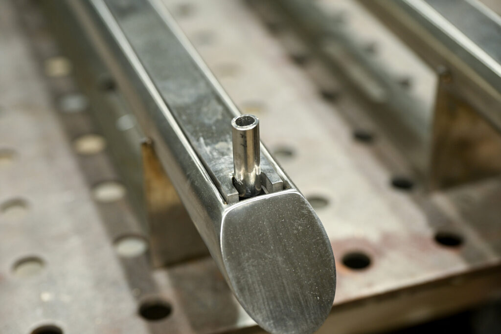 Stainless steel custom fabrication — steel vs aluminum gate comparison Miami
