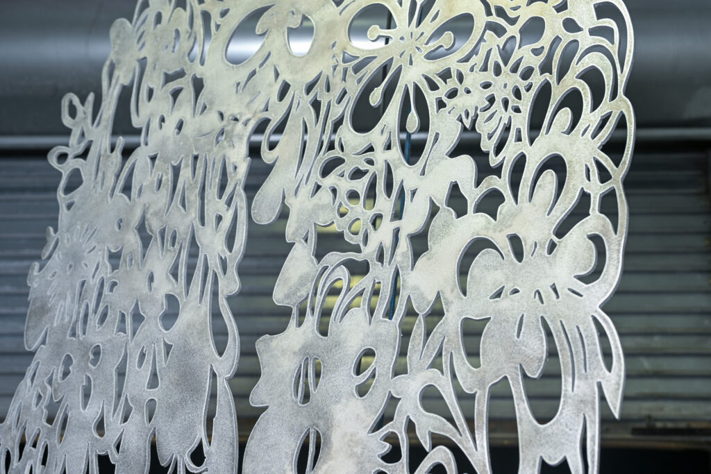 Precision-cut steel plate at Thor Metal Art — steel vs aluminum comparison